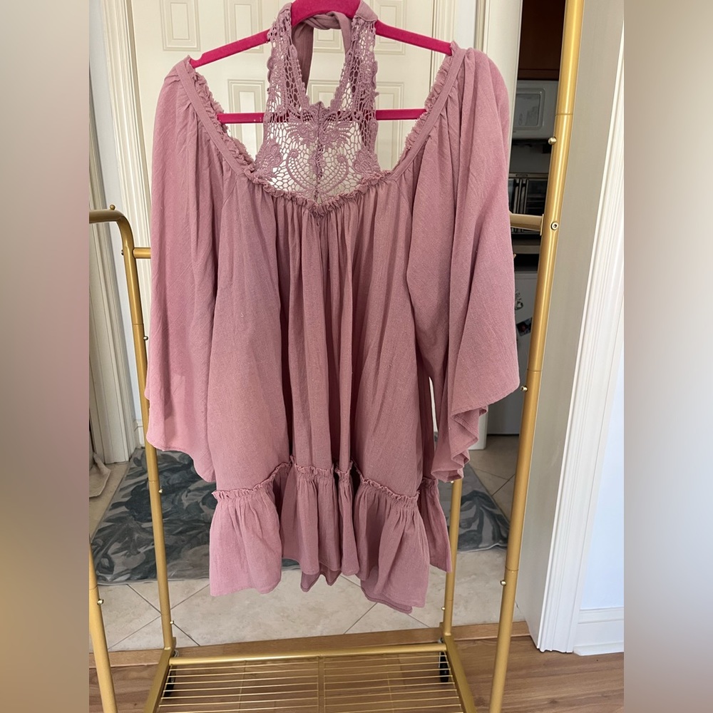 Never worn- Free People tunic dress with lace detailing and pockets